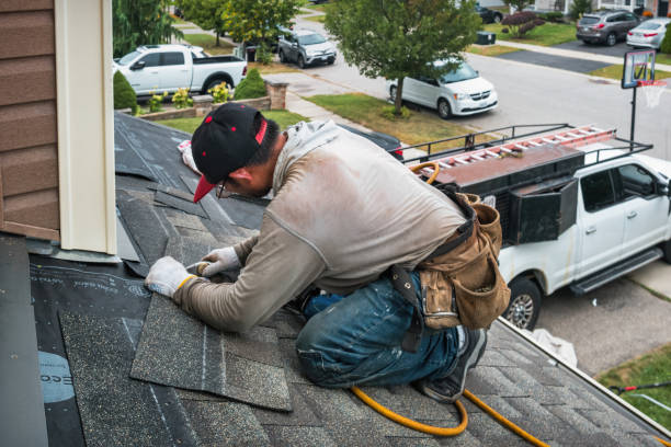 Professional Flat Roof Repair technician working in Rossville, MD